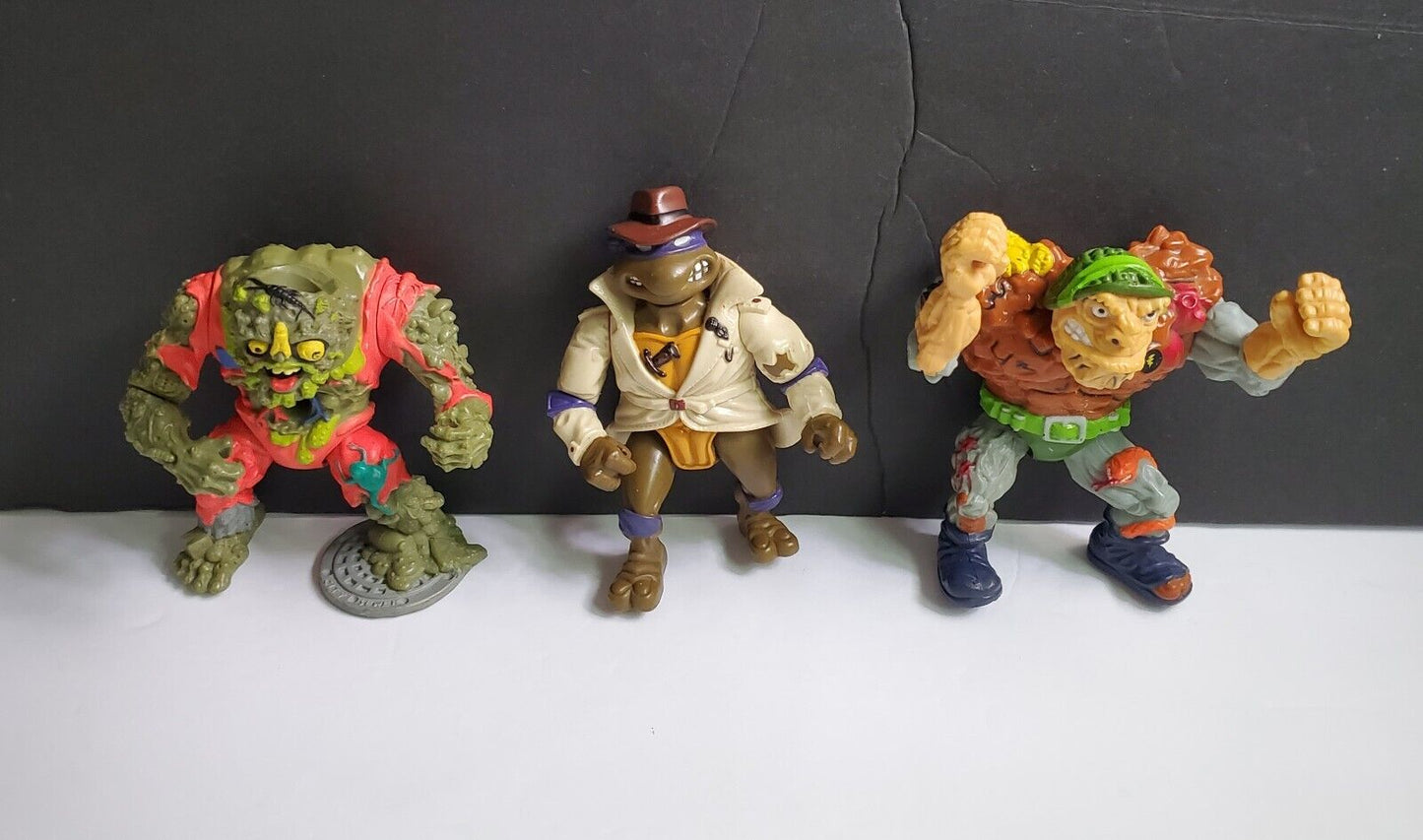Teenage Mutant Ninja Turtles Lot Of Three Vintage Figures. MuckMan, General Trag